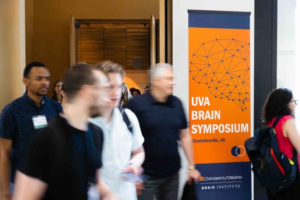 Attendees exit the meeting room.