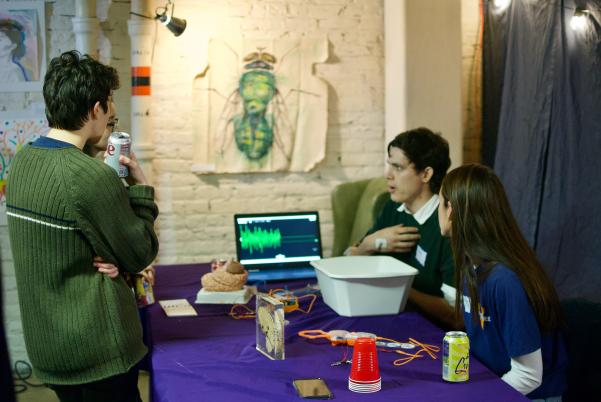 Volunteers from Brain Awareness Outreach present a neuroscience demo.