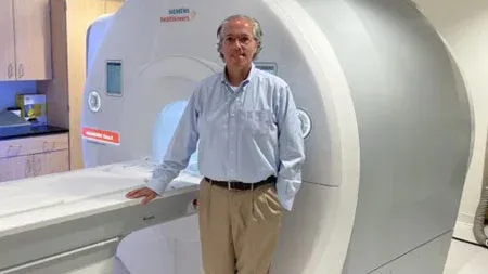 Man in front of MRI