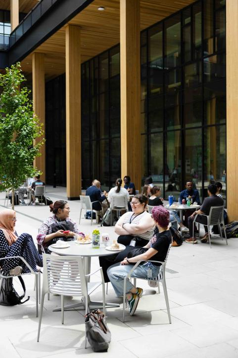 Attendees enjoy lunch outside