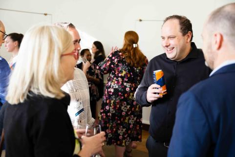 Guest and local faculty socialize.